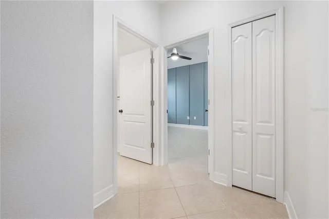 a view of a bathroom with a shower and a sink
