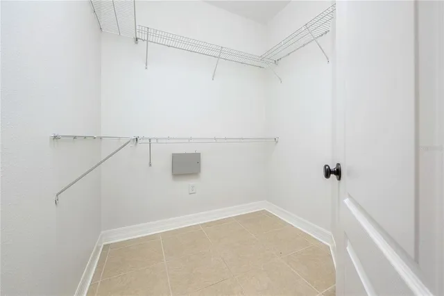 a view of a room with racks on the wall