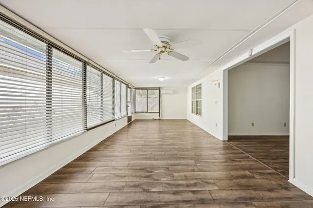 a kitchen with stainless steel appliances granite countertop a sink a stove and cabinets