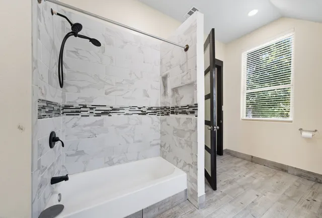 a view of entryway with wooden floor and stairs