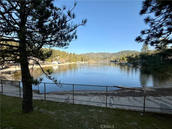 a view of lake with mountain