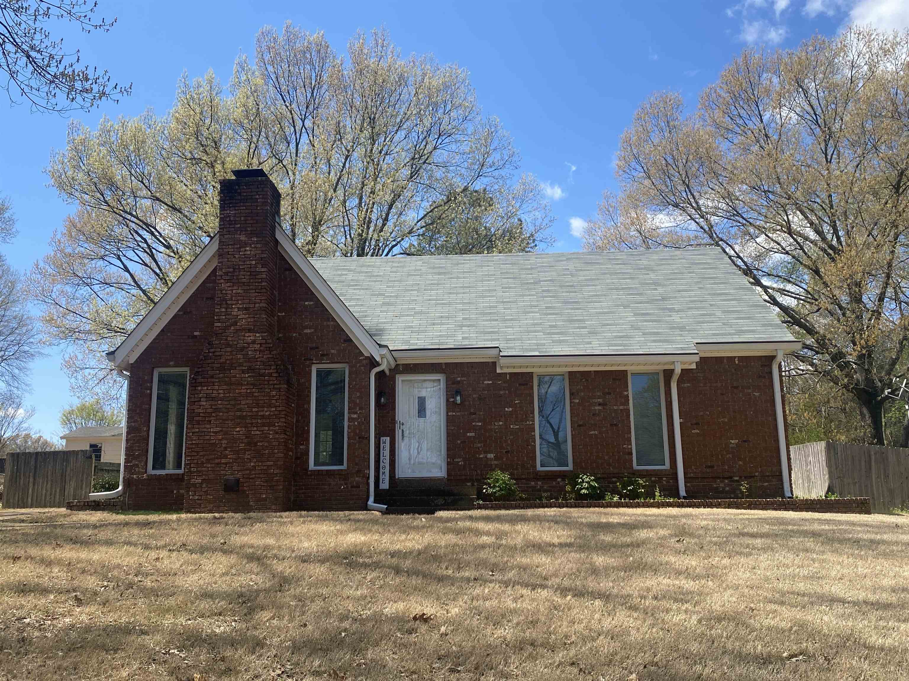 339 Dove Valley Road Collierville, TN 38017 - Photo 1 of 20 a front view of a house with a yard