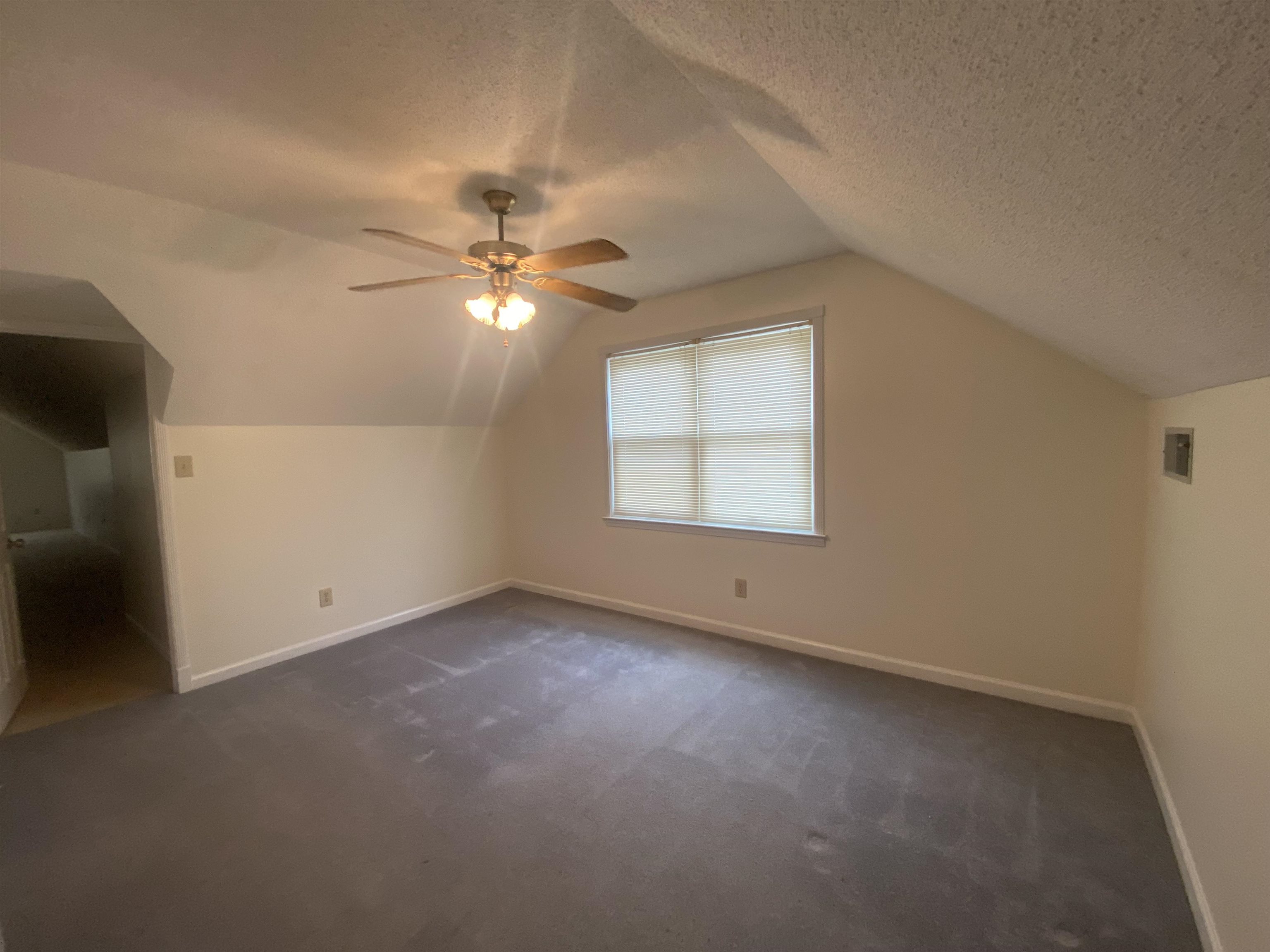 339 Dove Valley Road Collierville, TN 38017 - Photo 15 of 20 an empty room with windows and ceiling fan