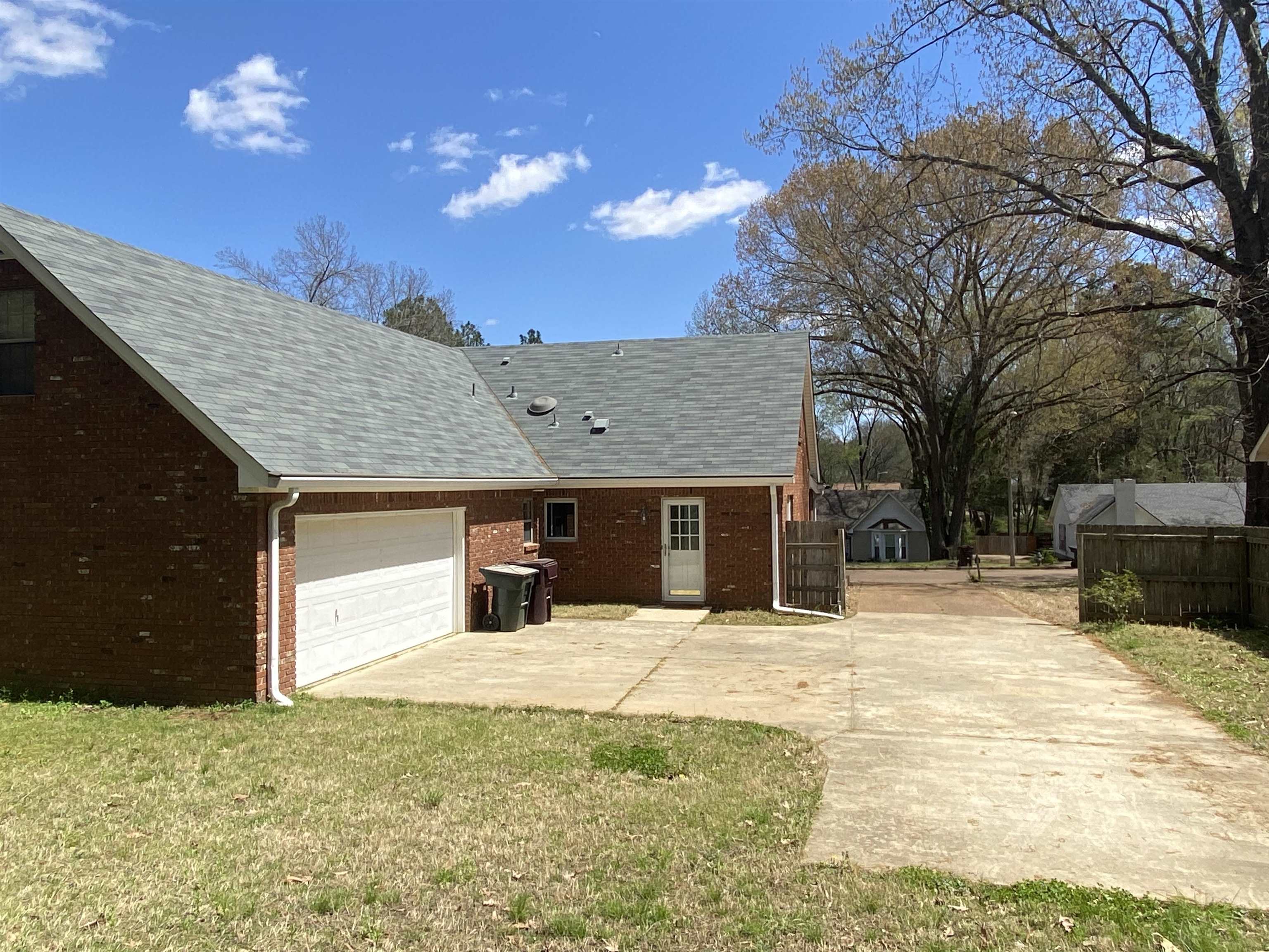 339 Dove Valley Road Collierville, TN 38017 - Photo 20 of 20 a house with trees in the background