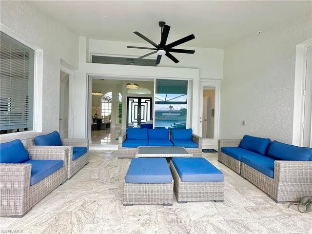 a view of yard with swimming pool and green space