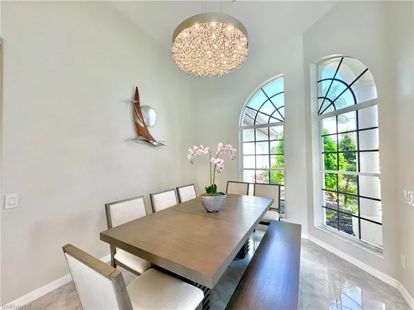 a bathroom with a sink and a window