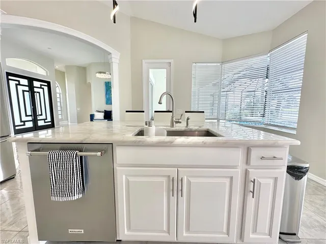 a view of a bathroom with a tub and shower