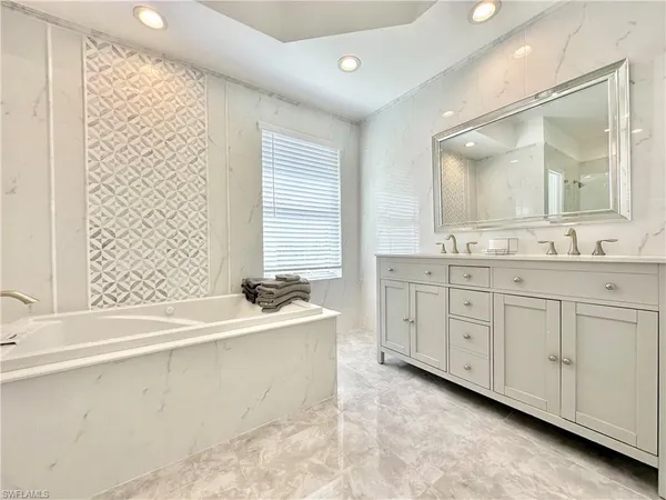 a bathroom with a shower and a sink