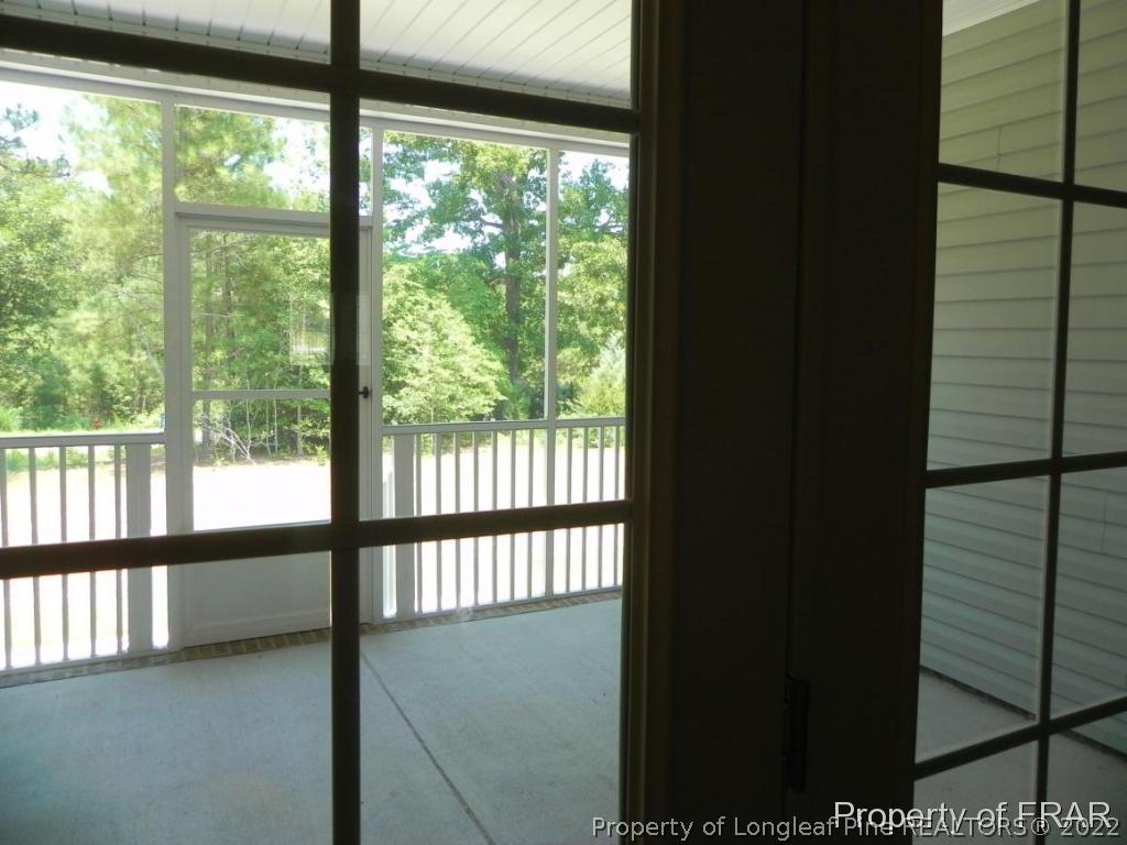 1280 Rays Bridge Road Whispering Pines, NC 28327 - Photo 19 of 22 a view of an empty room with a window