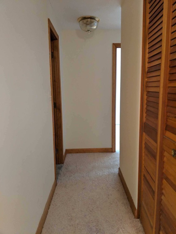 48 Great Road, Unit 22 Acton, MA 01720 - Photo 11 of 18 a view of a hallway