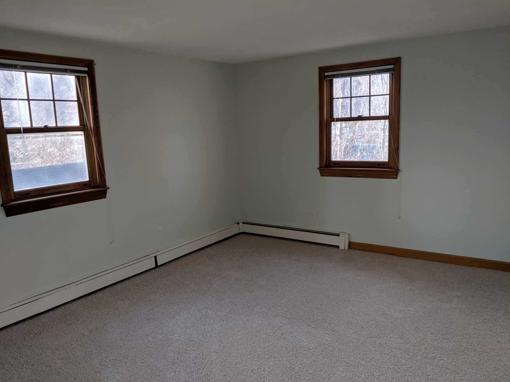 48 Great Road, Unit 22 Acton, MA 01720 - Photo 13 of 18 an empty room with a window