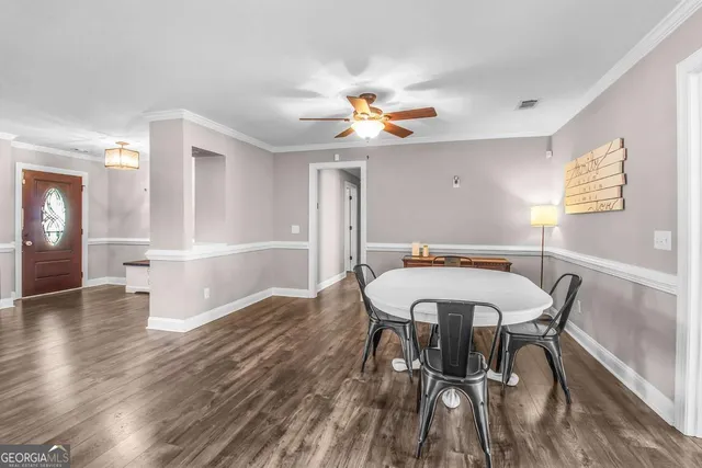 a kitchen with granite countertop a sink and a stove