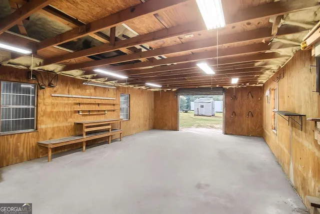 a view of a tiny house with a yard