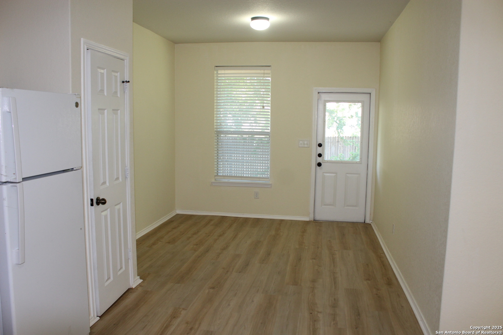 482 Walnut Crest Selma, TX 78154 - Photo 9 of 19 an empty room with wooden floor and closet