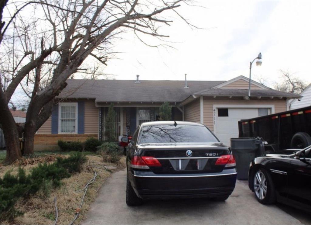 4711 Bonnie View Road Dallas, TX 75216 - Photo 1 of 1 Ranch-style home with a garage