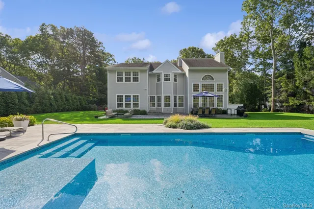 a view of a house with a swimming pool