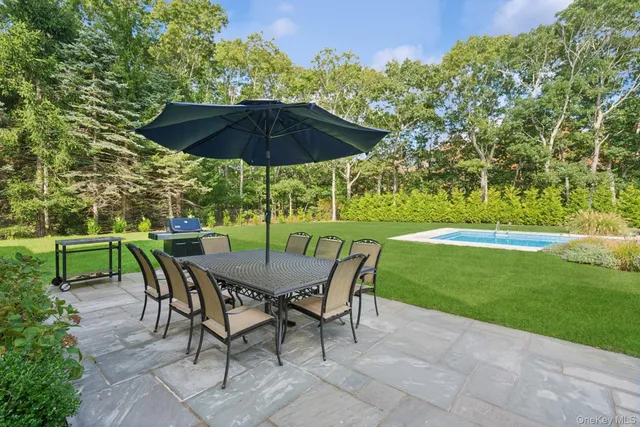 a view of an outdoor sitting area with golf course
