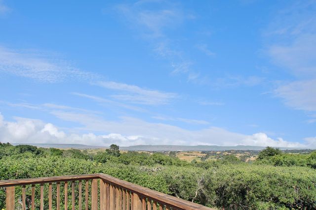 a balcony with an outdoor space