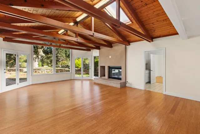 an empty room with windows