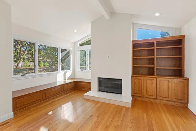 a kitchen with white cabinets and a sink