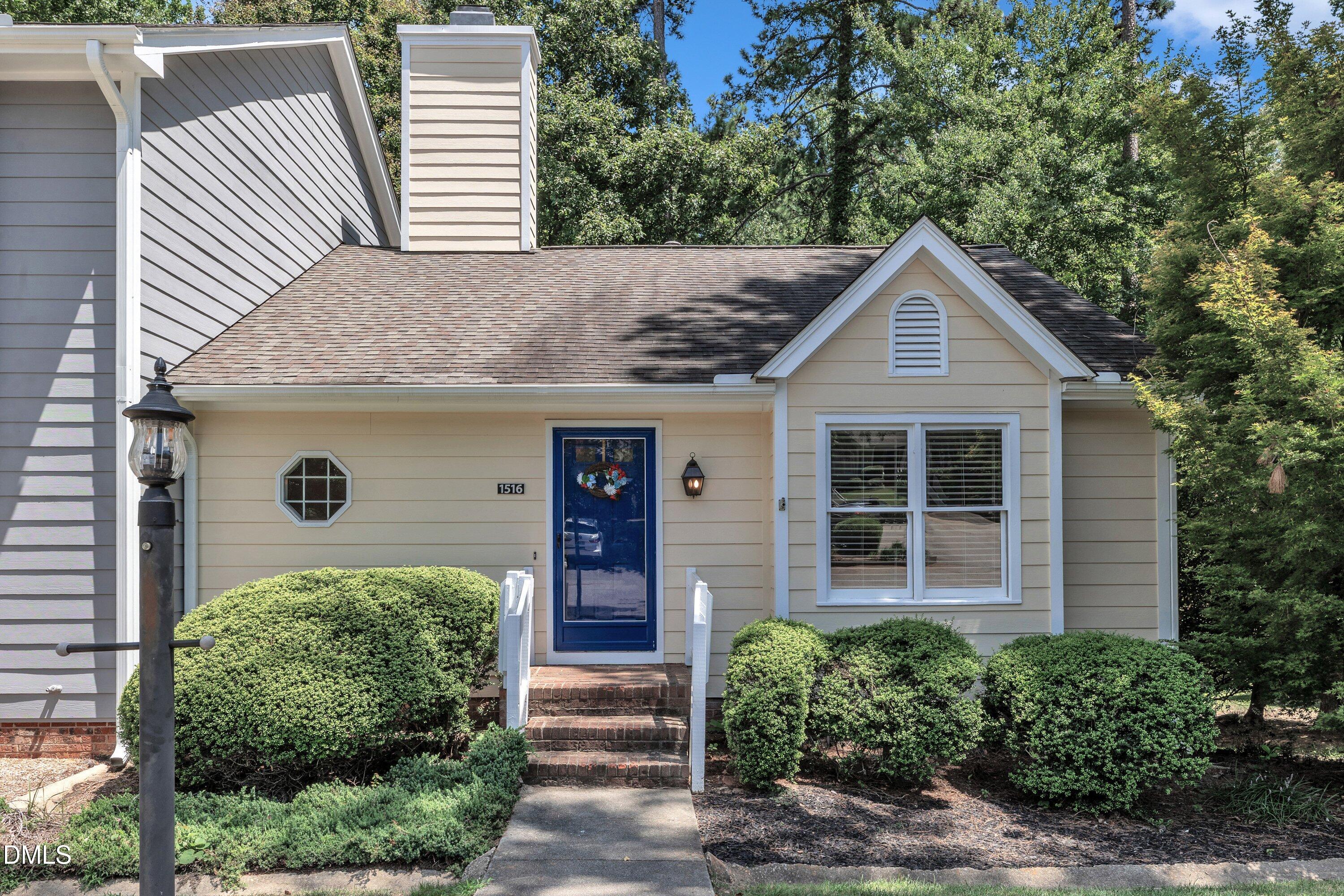 1516 Hemphill Drive Raleigh, NC 27609 - Photo 1 of 28 a front view of a house with garden