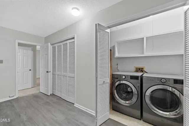 a view of a backyard with sitting area