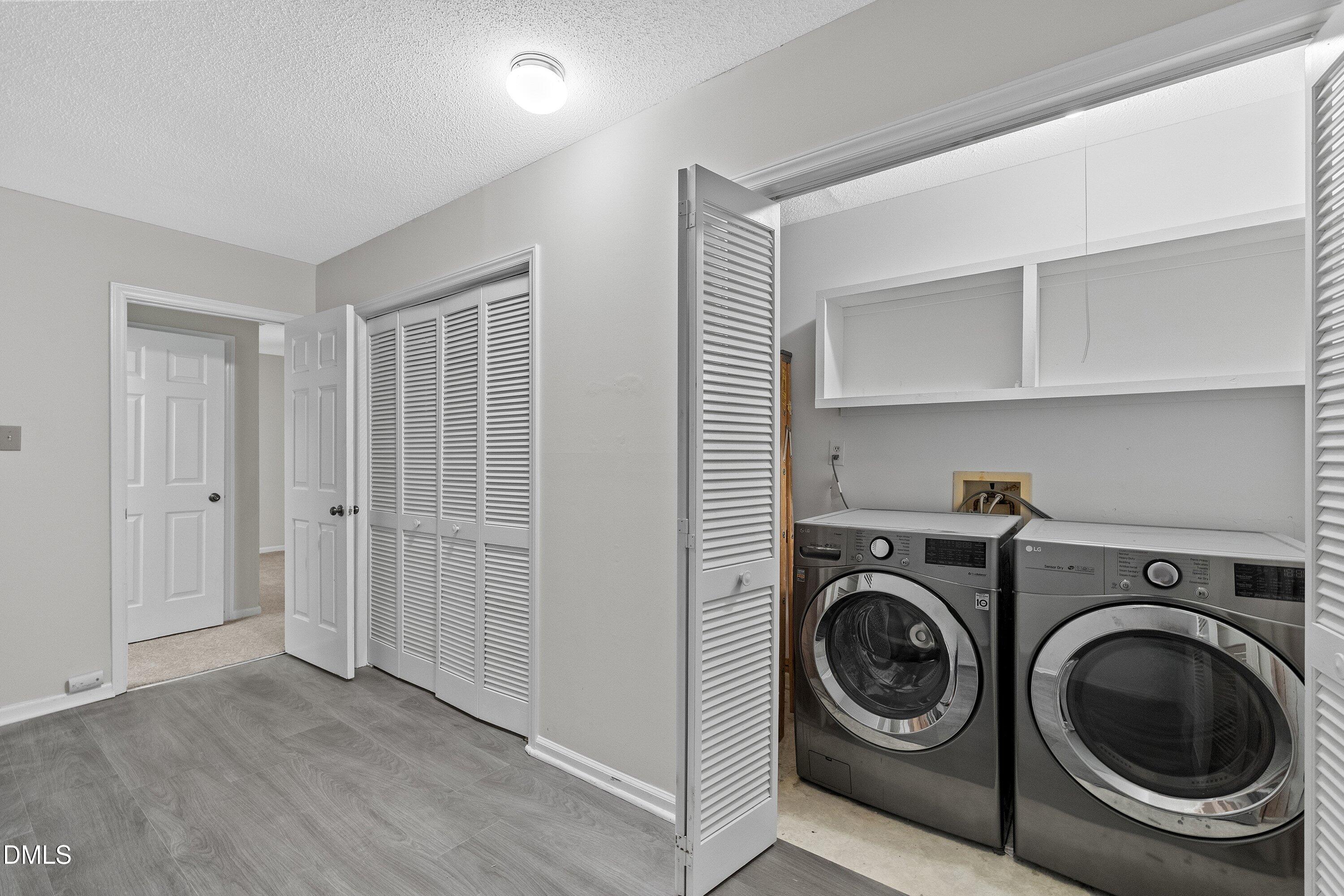 1516 Hemphill Drive Raleigh, NC 27609 - Photo 19 of 28 a view of a storage & utility room with washer and dryer