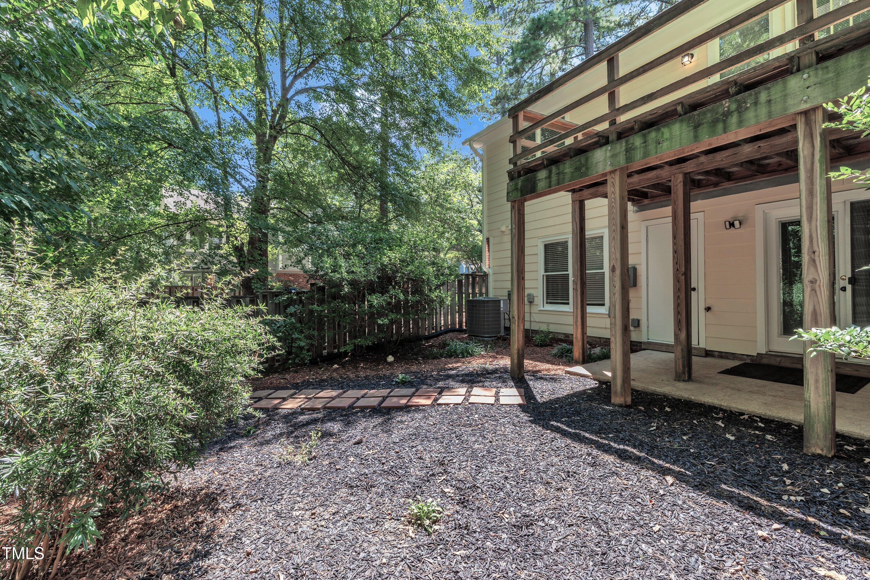 1516 Hemphill Drive Raleigh, NC 27609 - Photo 21 of 28 a view of a house with a yard