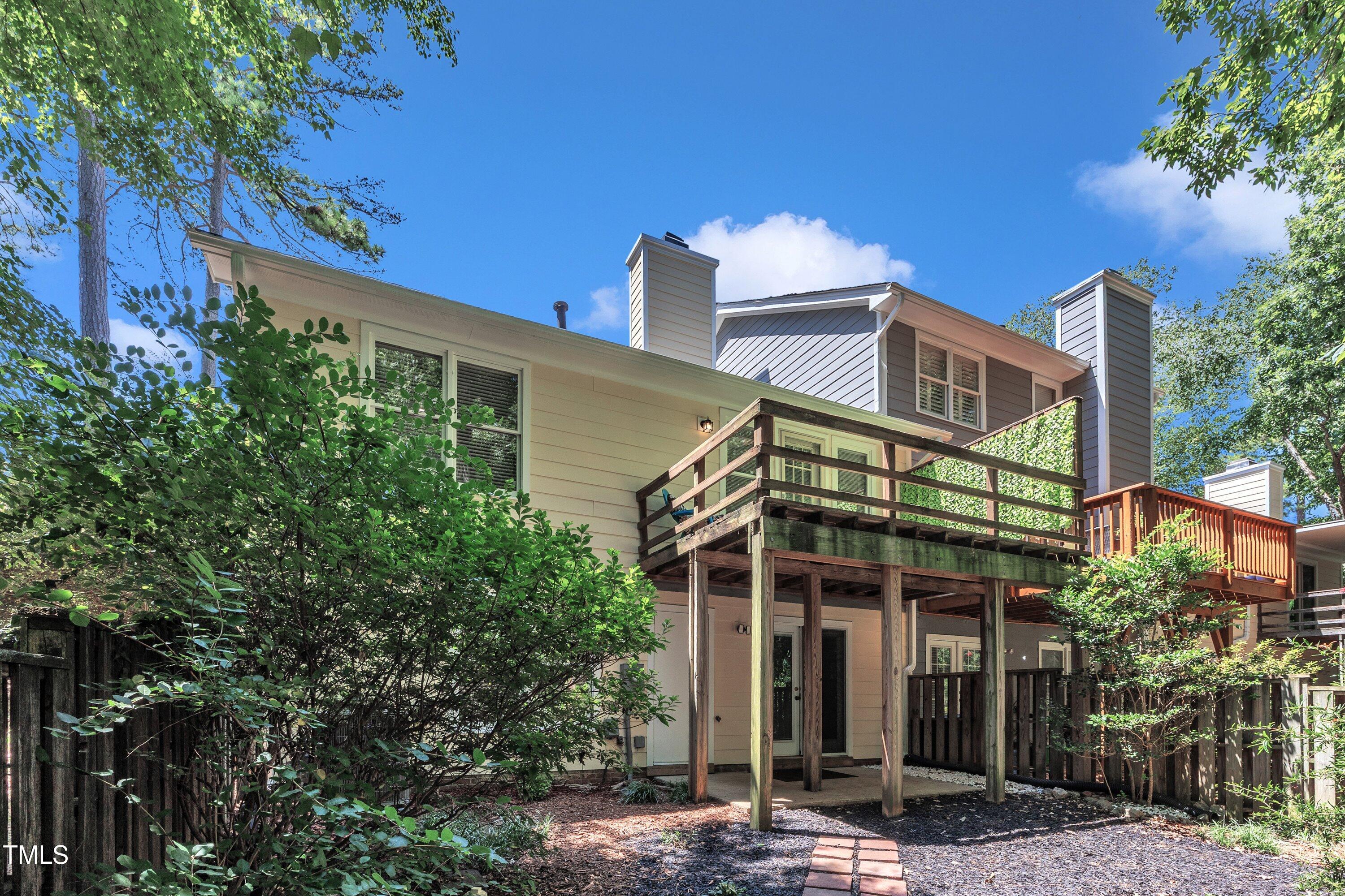 1516 Hemphill Drive Raleigh, NC 27609 - Photo 23 of 28 a front view of a building with a garden