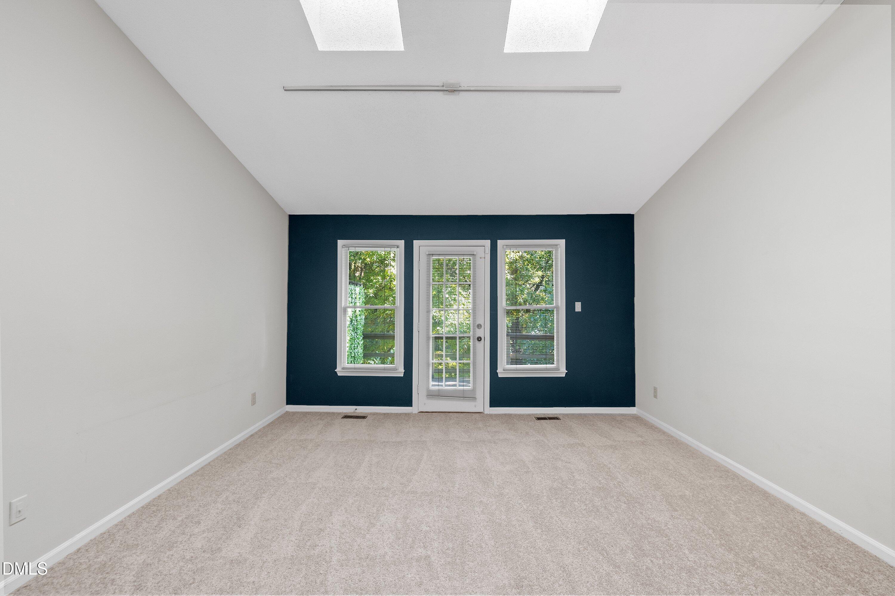 1516 Hemphill Drive Raleigh, NC 27609 - Photo 5 of 28 a view of an empty room with a window