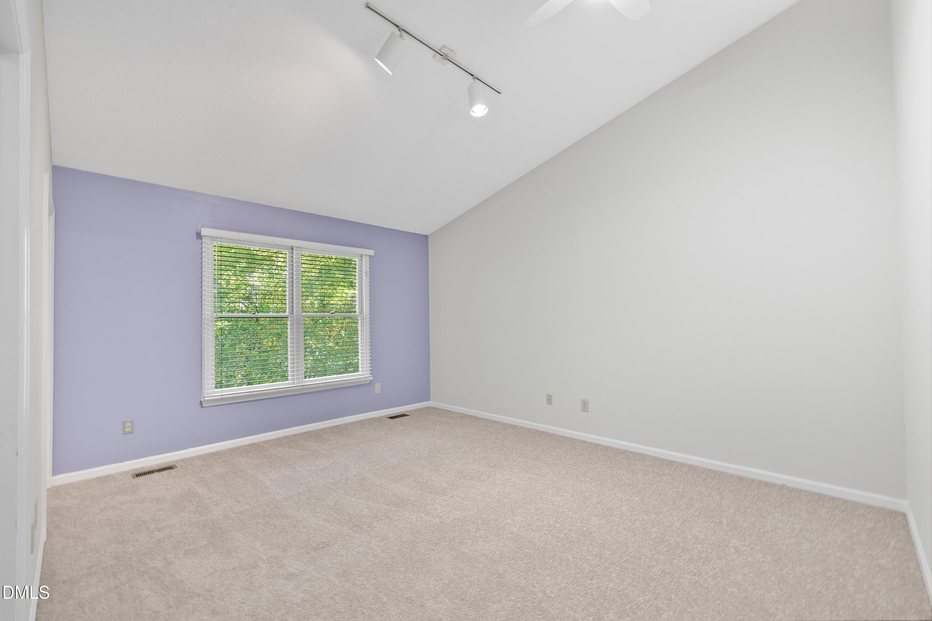 1516 Hemphill Drive Raleigh, NC 27609 - Photo 9 of 28 an empty room with windows