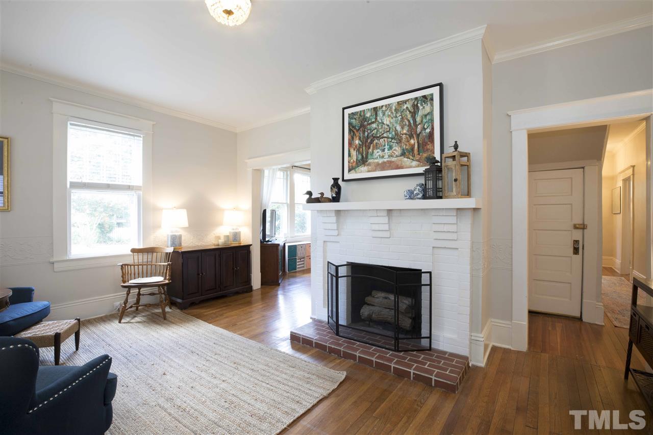 720 North Bloodworth Street Raleigh, NC 27604 - Photo 7 of 27 a living room with furniture and a fireplace