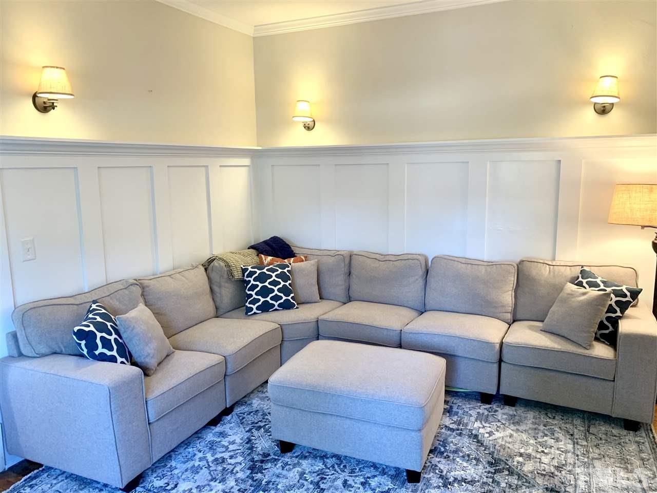 720 North Bloodworth Street Raleigh, NC 27604 - Photo 10 of 27 a living room with furniture and a couch