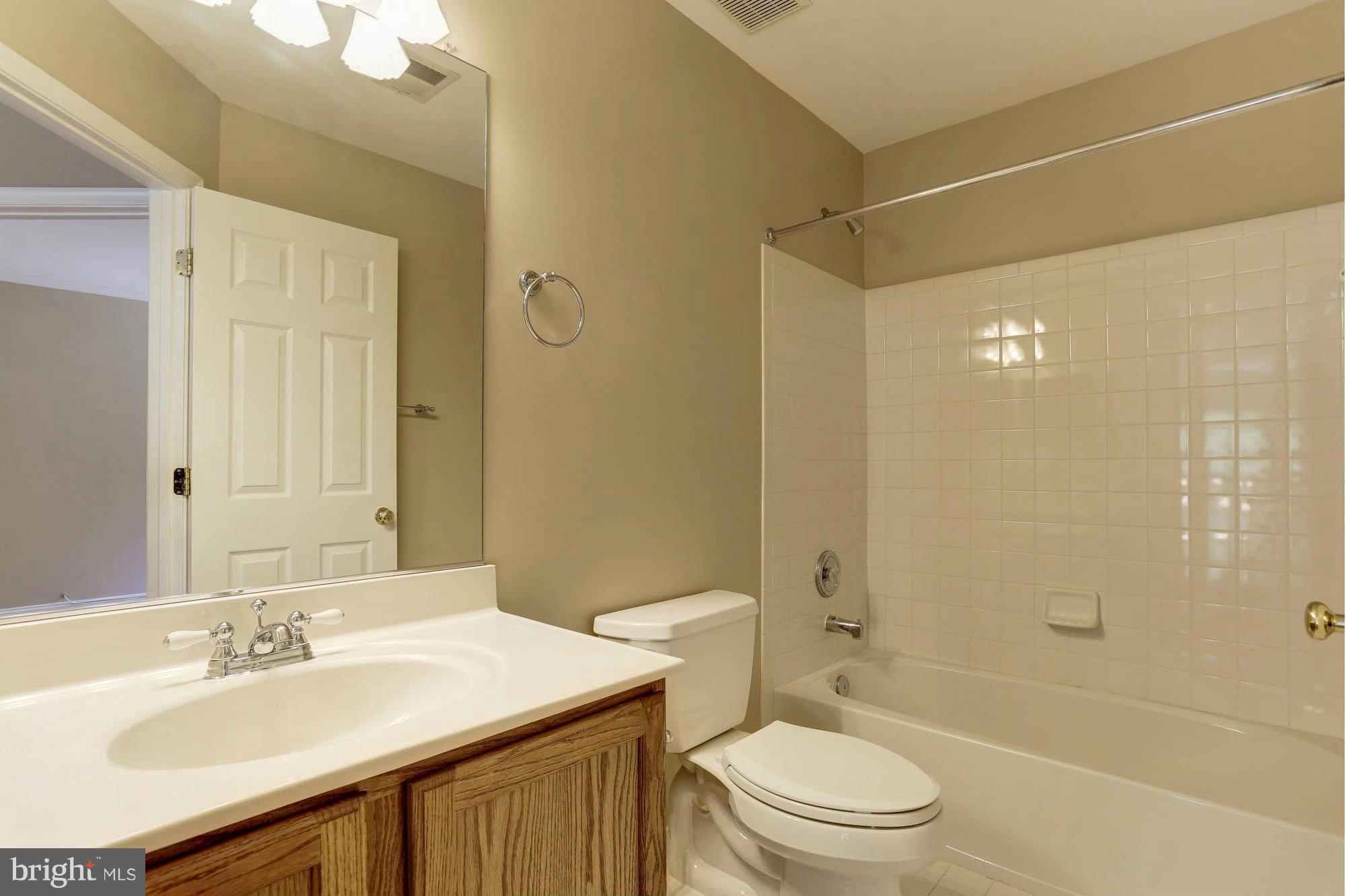 8804 Sumner Grove Drive Laurel, MD 20708 - Photo 22 of 30 Hallway Bathroom