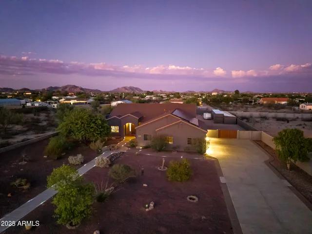 an aerial view of a house with garden space