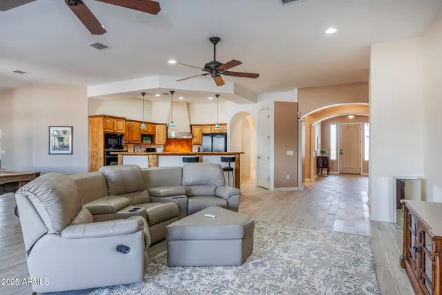 a living room with a couch and a flat screen tv