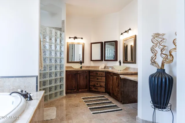 a view of a workspace with wooden floor and chair
