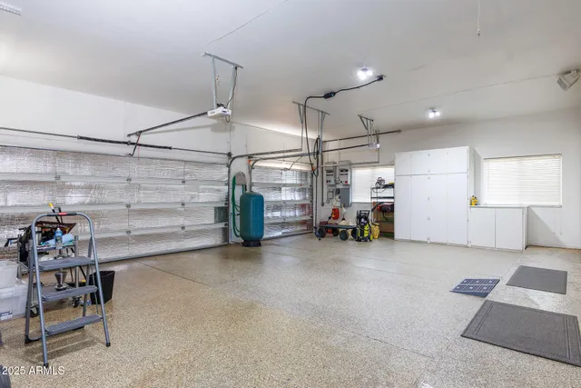 an aerial view of house with yard