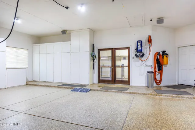 an aerial view of a house with a lake view