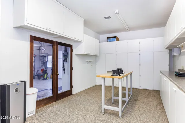 an aerial view of a house with a ocean view