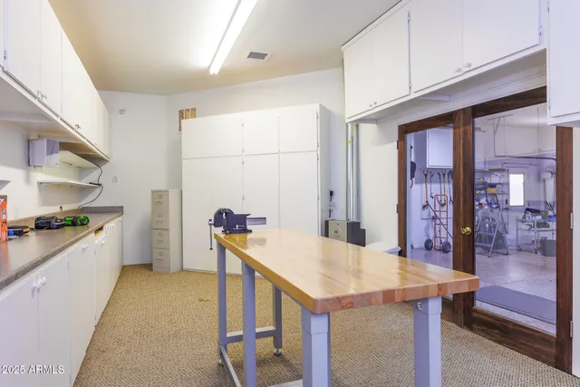 a view of swimming pool with a yard