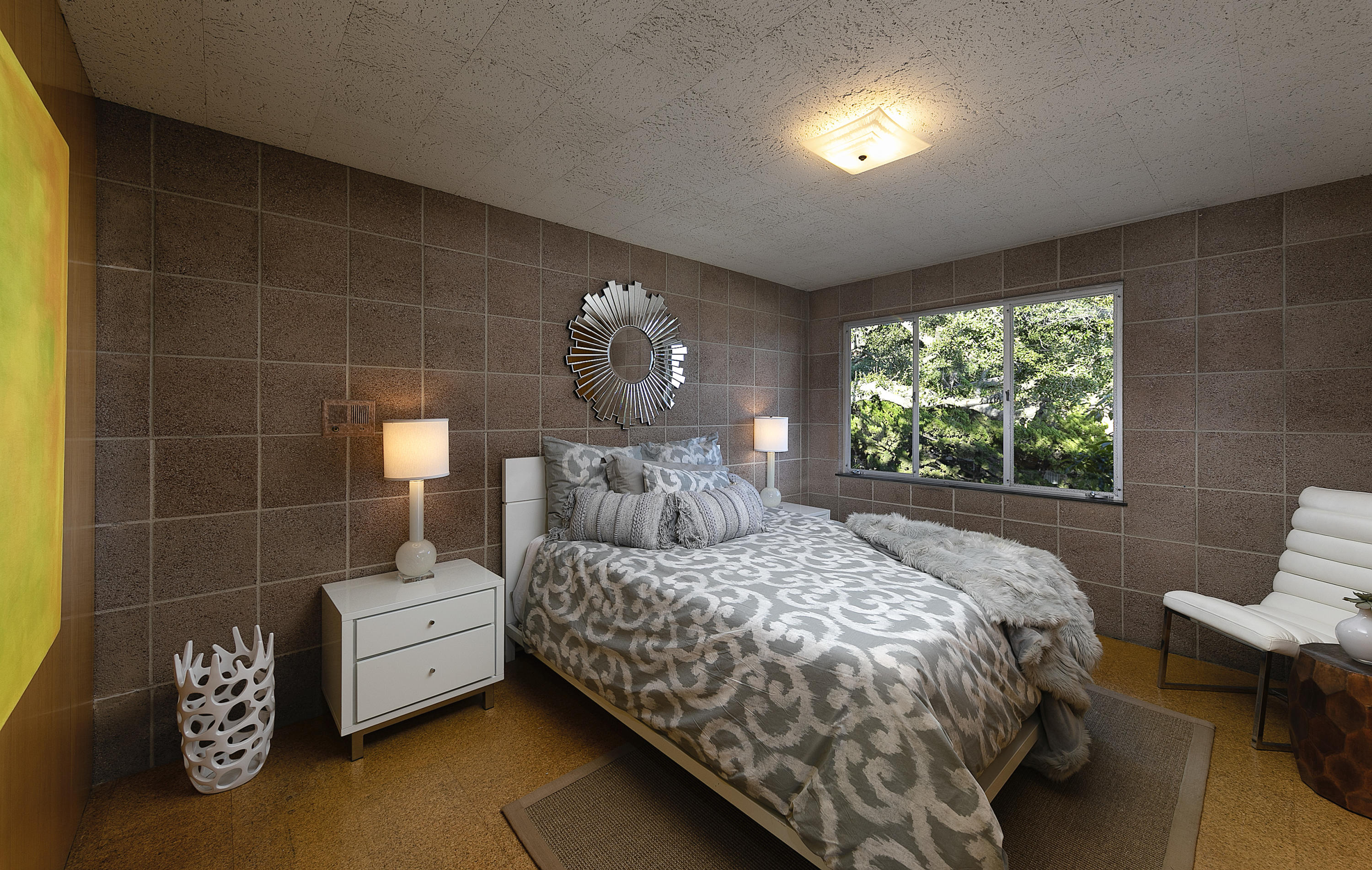 976 East Carrillo Road Santa Barbara, CA 93103 - Photo 12 of 22 a bedroom with a bed and a window