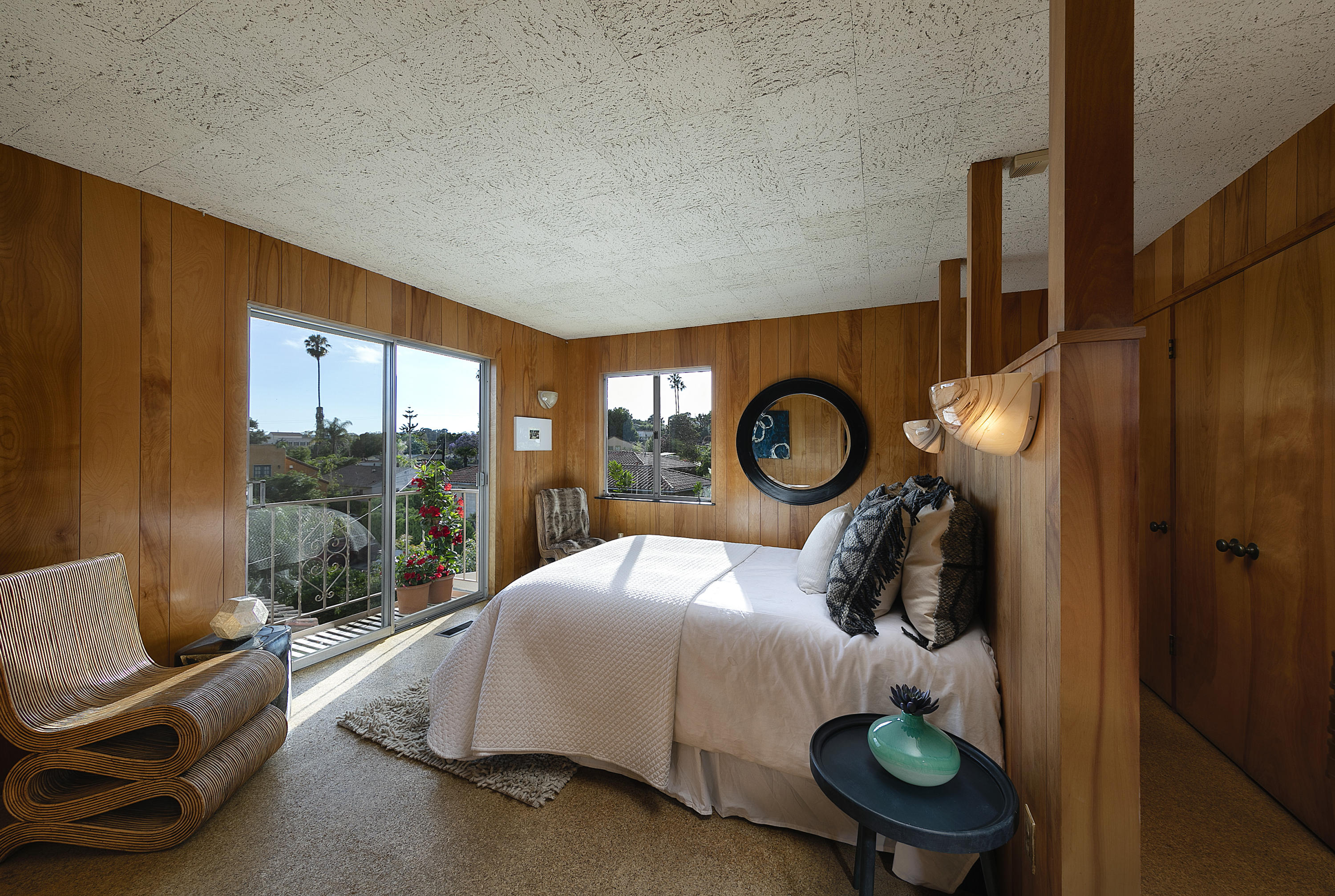 976 East Carrillo Road Santa Barbara, CA 93103 - Photo 14 of 22 a bed sitting in a bedroom next to a window