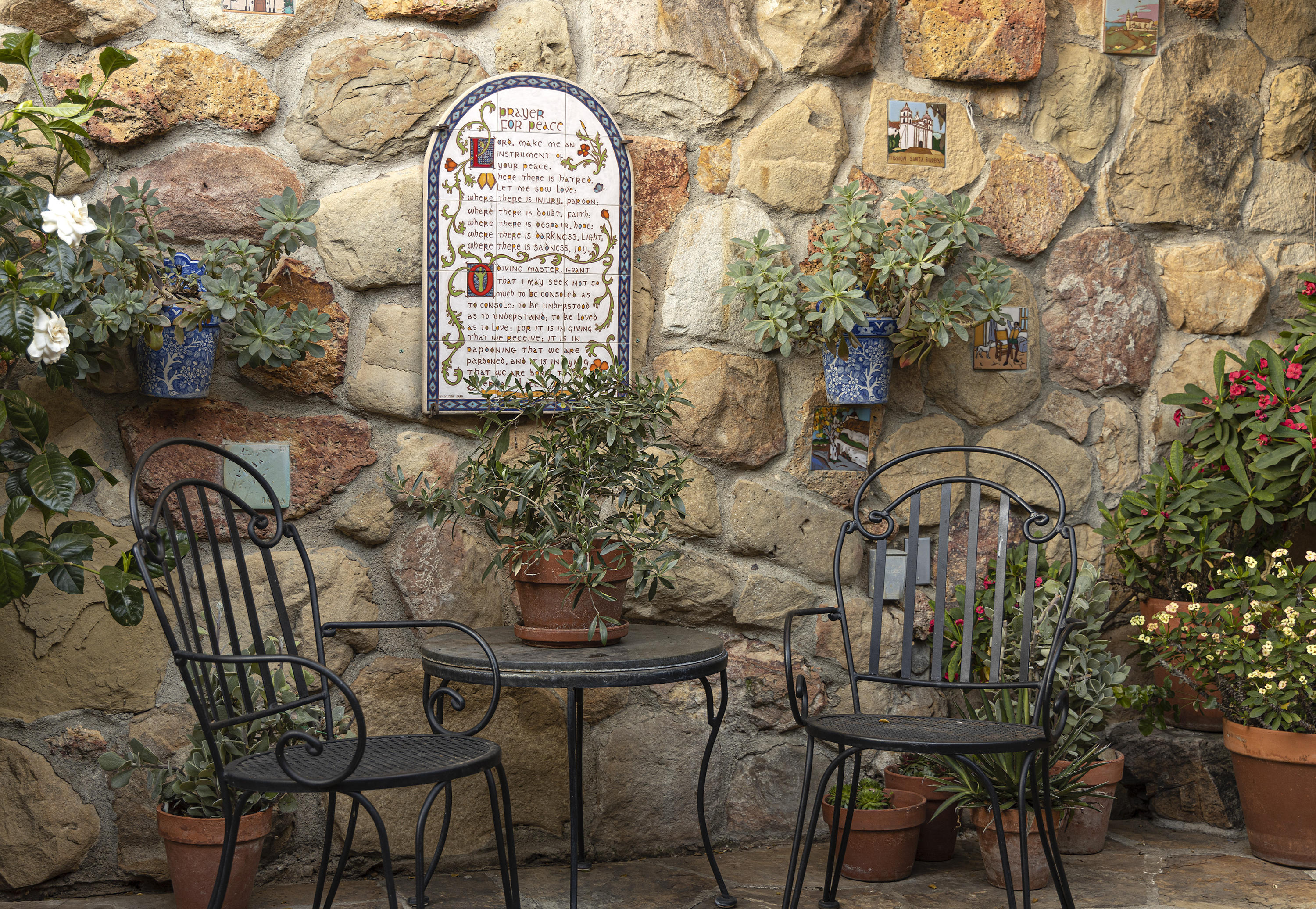 976 East Carrillo Road Santa Barbara, CA 93103 - Photo 17 of 22 a view of a chairs and table in the patio