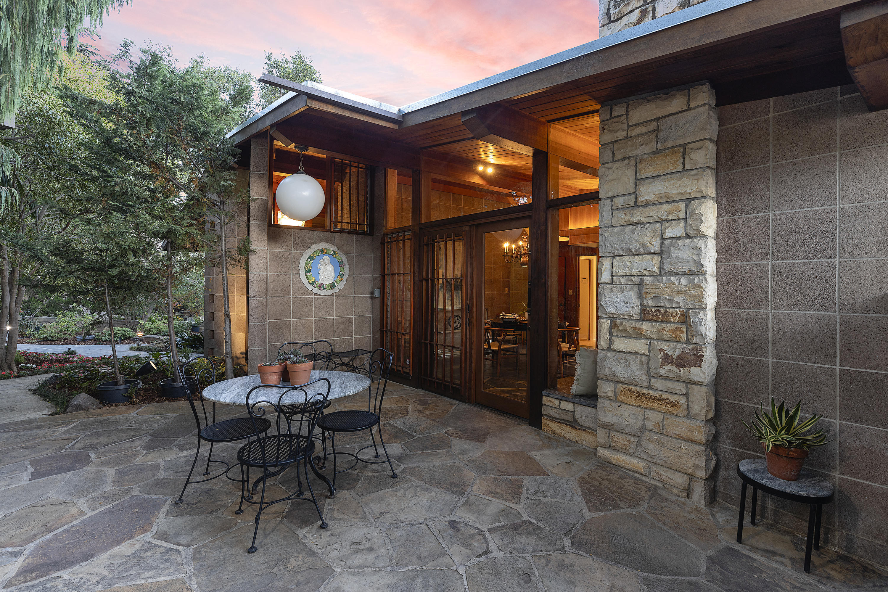 976 East Carrillo Road Santa Barbara, CA 93103 - Photo 8 of 22 a view of a dinning table and chairs in the patio