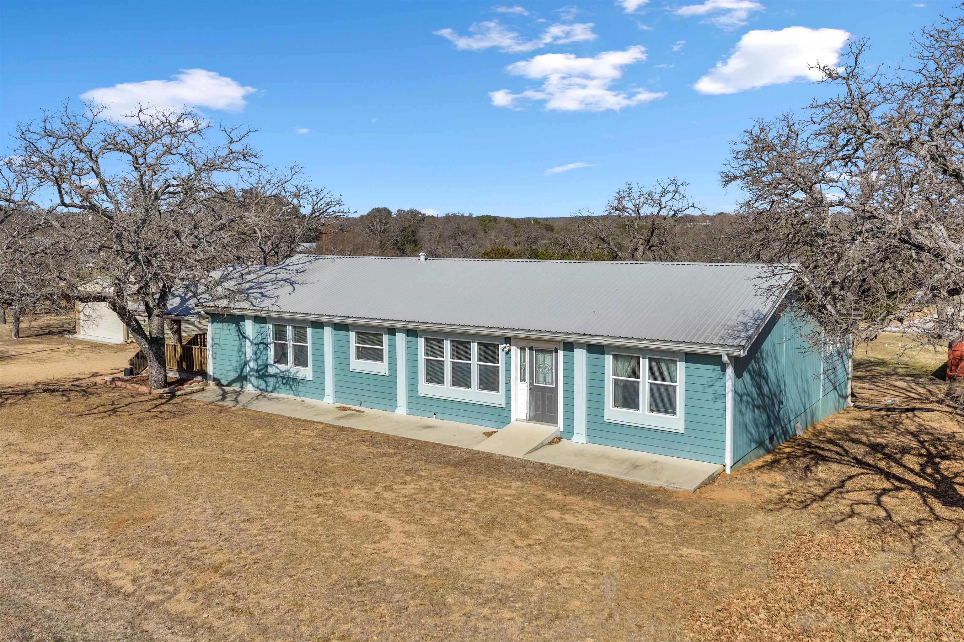 a house view with a garden space