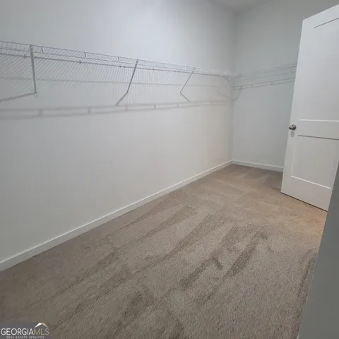 a view of a room with racks on the wall