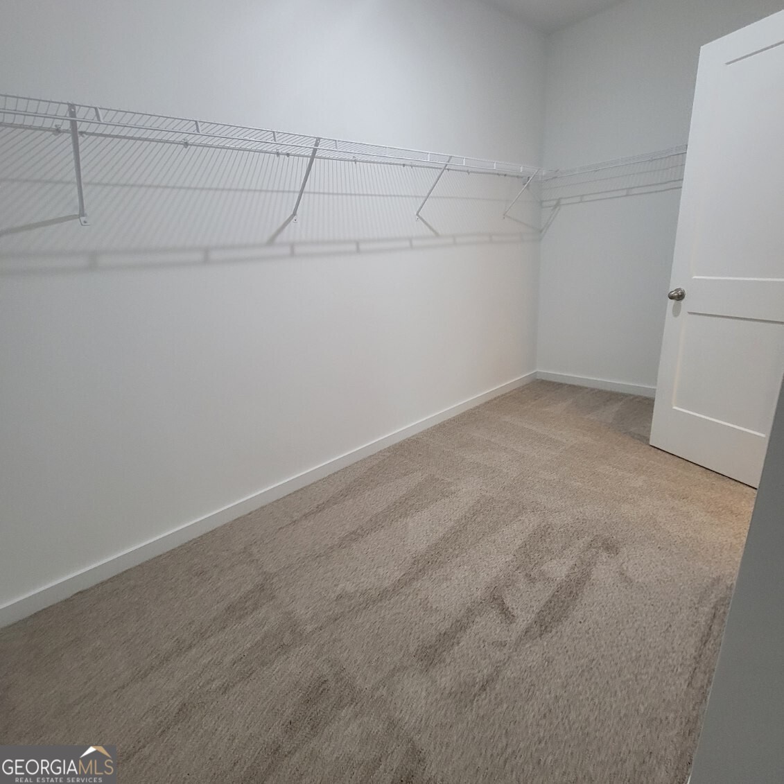 107 Breakwater Way Perry, GA 31069 - Photo 13 of 31 a view of a room with racks on the wall