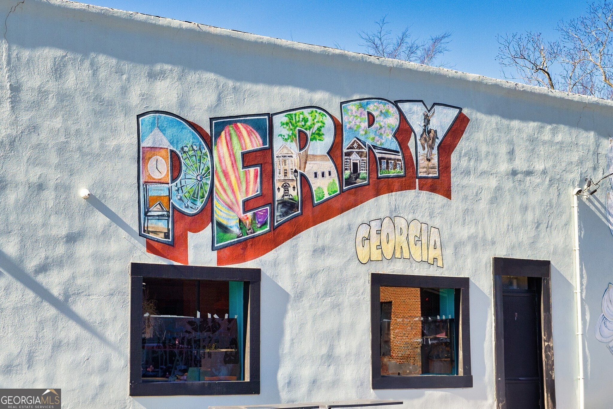 107 Breakwater Way Perry, GA 31069 - Photo 20 of 31 a sign on the wall of building