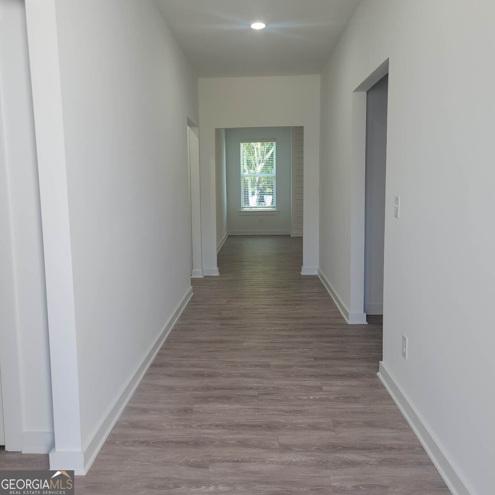 107 Breakwater Way Perry, GA 31069 - Photo 2 of 31 a view of entryway with wooden floor
